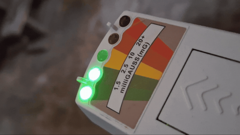 The EMF reader is shown flickering from green to amber.