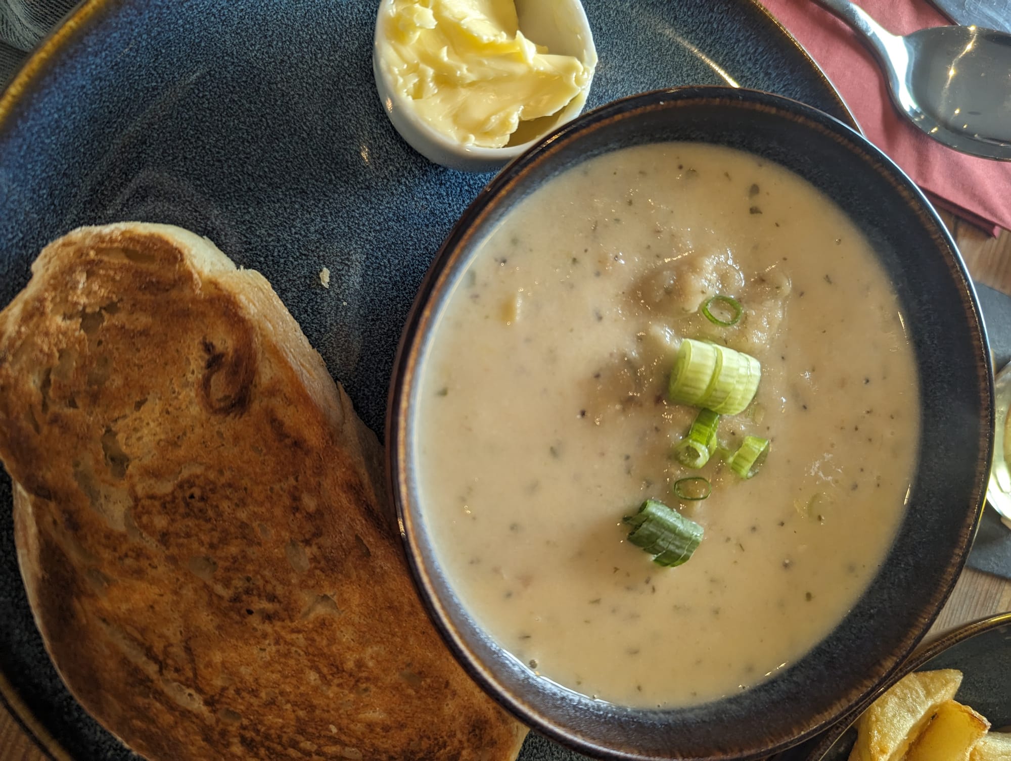 Cullen skink served with a side of bread and butter.