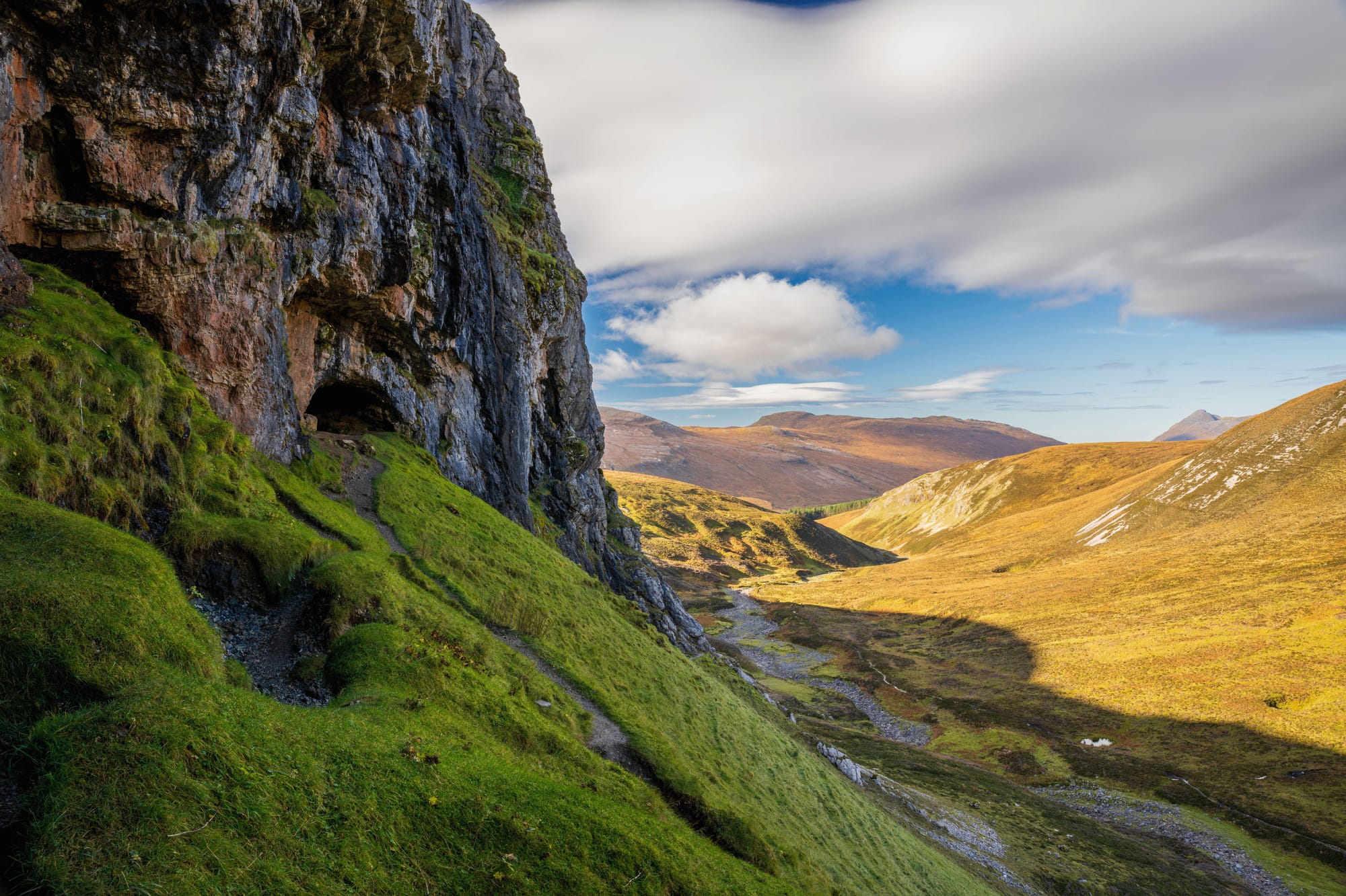 The Bone Caves at the base of a rocky outcrop.