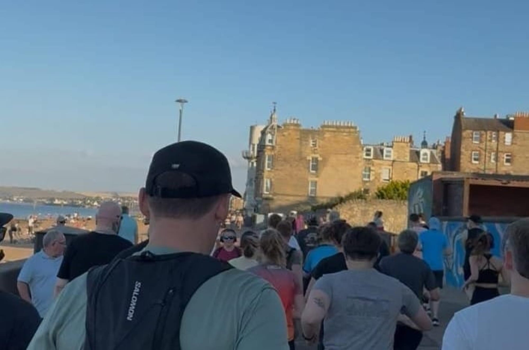 Runners from GTRC running along Portobello Promenade.