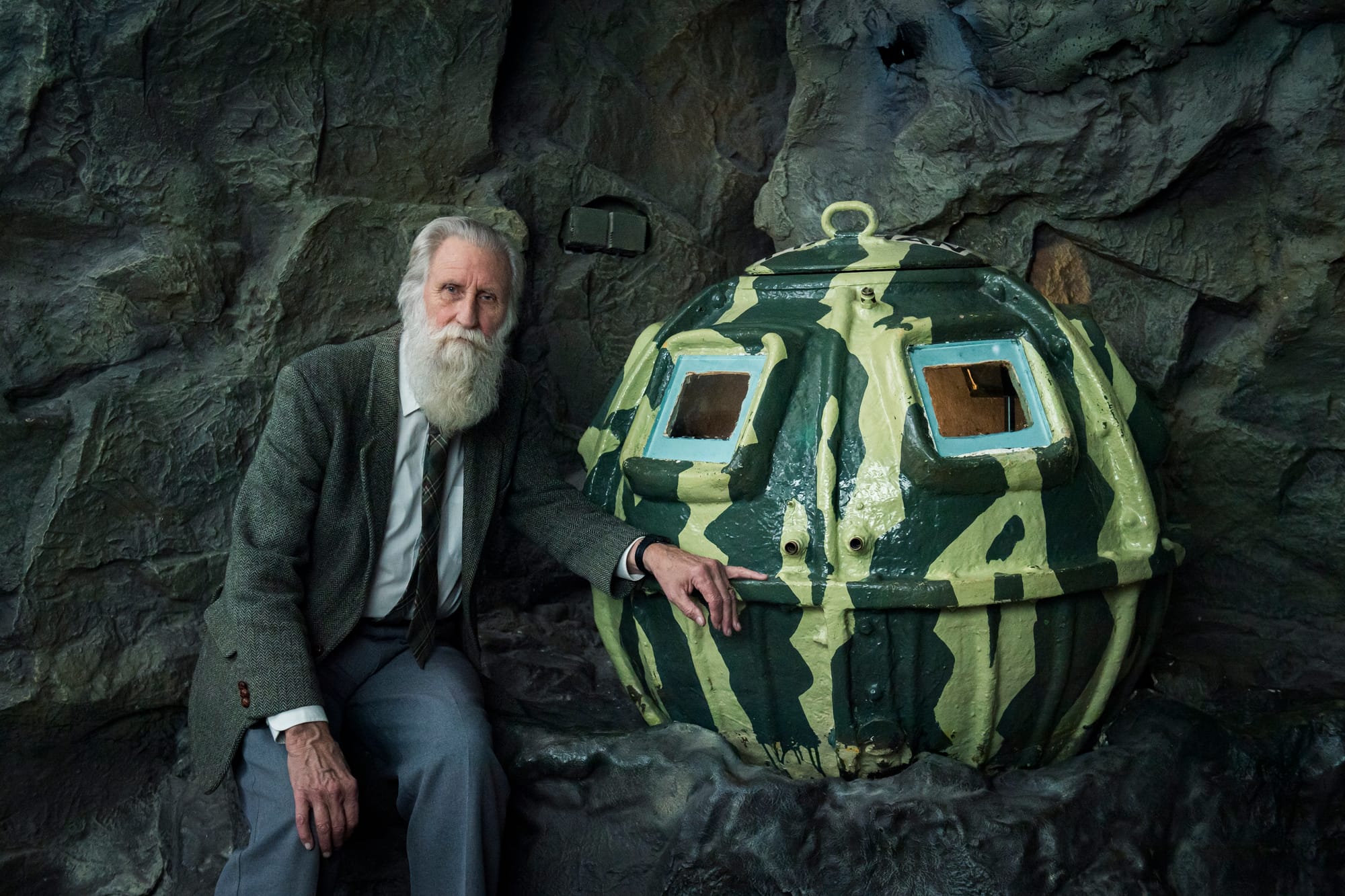 Adrian with the spherical submersible. It is about half the height of Adrian and painted to be camouflaged.