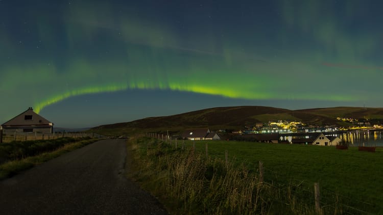 Green northern lights over Scalloway in the Shetland Isles.