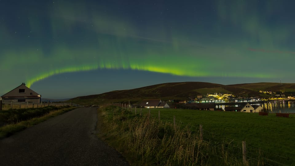 Green northern lights over Scalloway in the Shetland Isles.